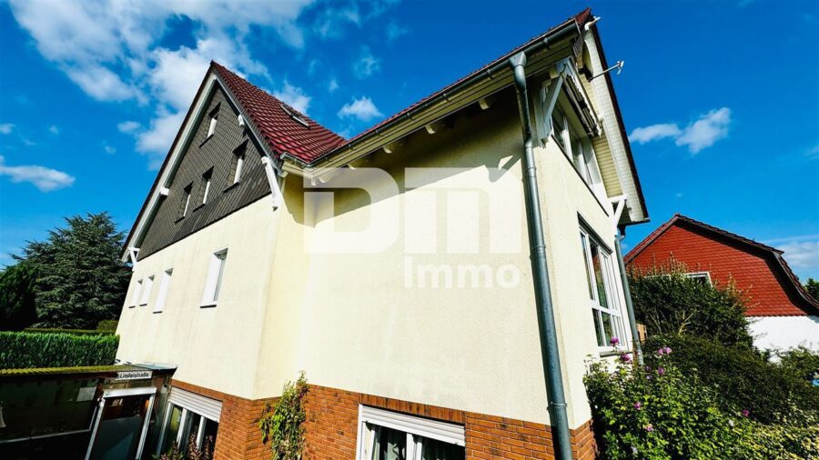 Schönes Mehrfamilienhaus geteilt nach WEG mit umfangreichen Nutzflächen und Traumgrundstück - Seitenansicht